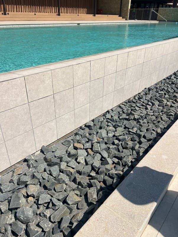 FRP grating installation at resort water feature